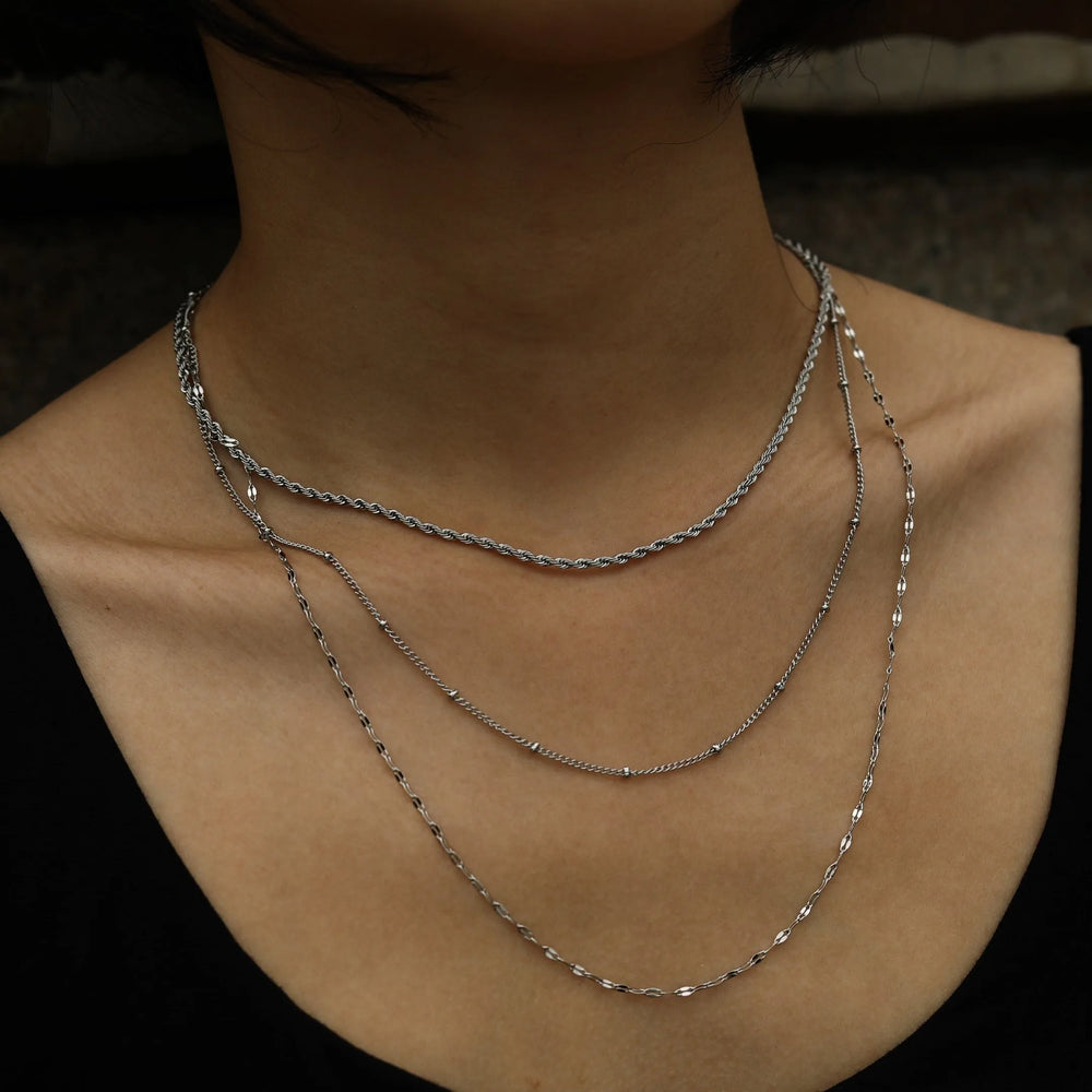 Collier ZURI à trois rangs et chaînes mixtes en argent