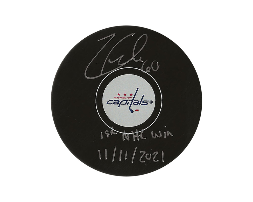 Rondelle modèle autographe des Capitals de Washington, autographiée par Zach Fucale, avec l'inscription "1st NHL Win 11/11/2021".