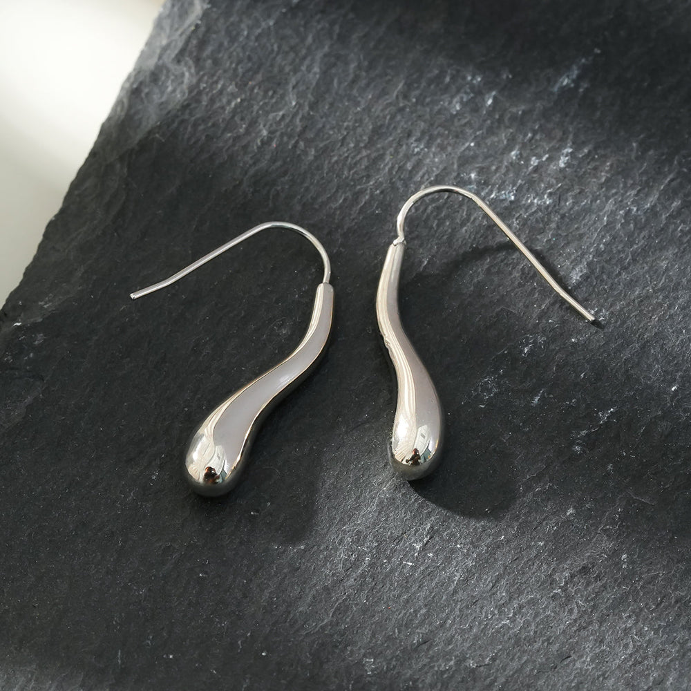 Boucles d'oreilles Style CORNING Argent (Or Blanc) : Forme de Têtard – Élégance Unique avec une Touche Ludique