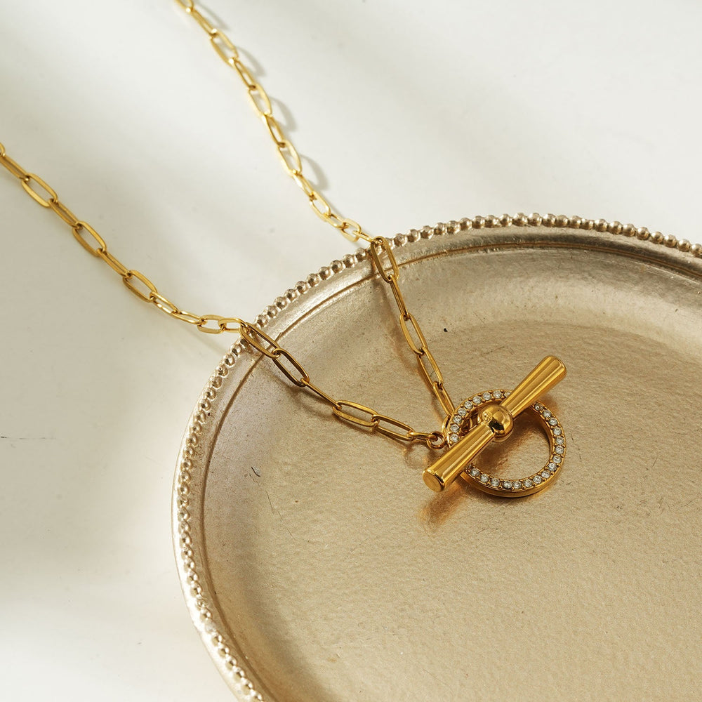 SADIKA Or : Collier à fermoir à bascule moderne pavé de zircone