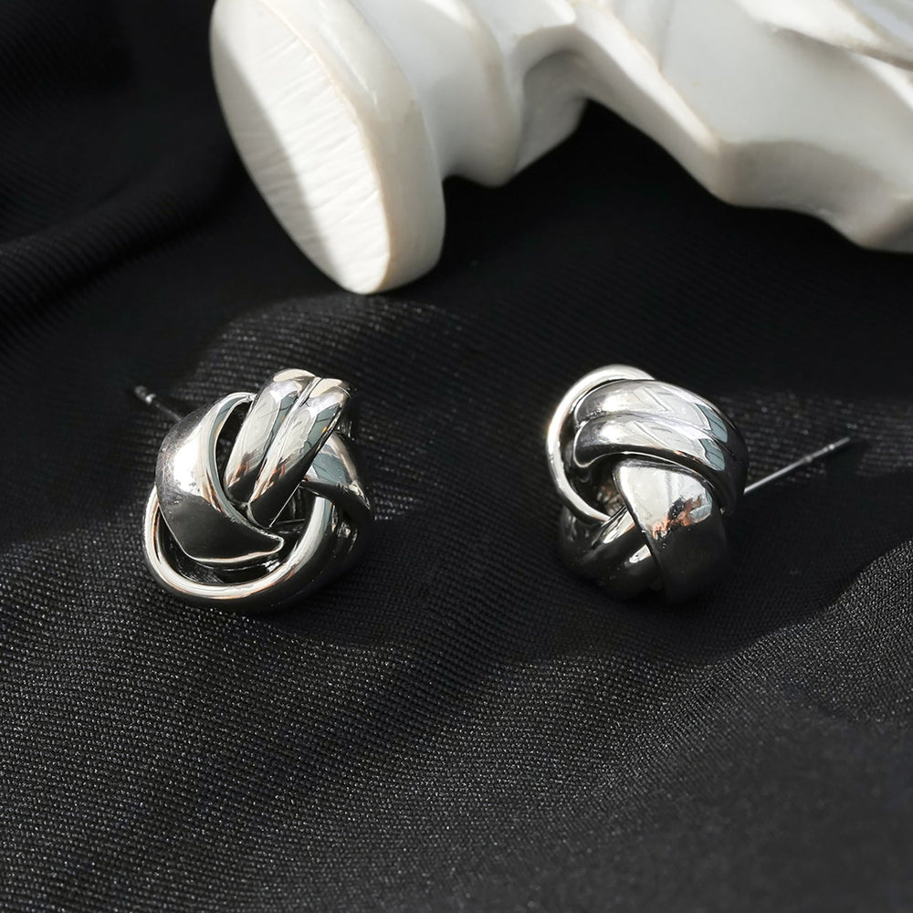 Boucles d'oreilles clous JATANI Argenté 18K Or Blanc : Nœud d'amour contemporain