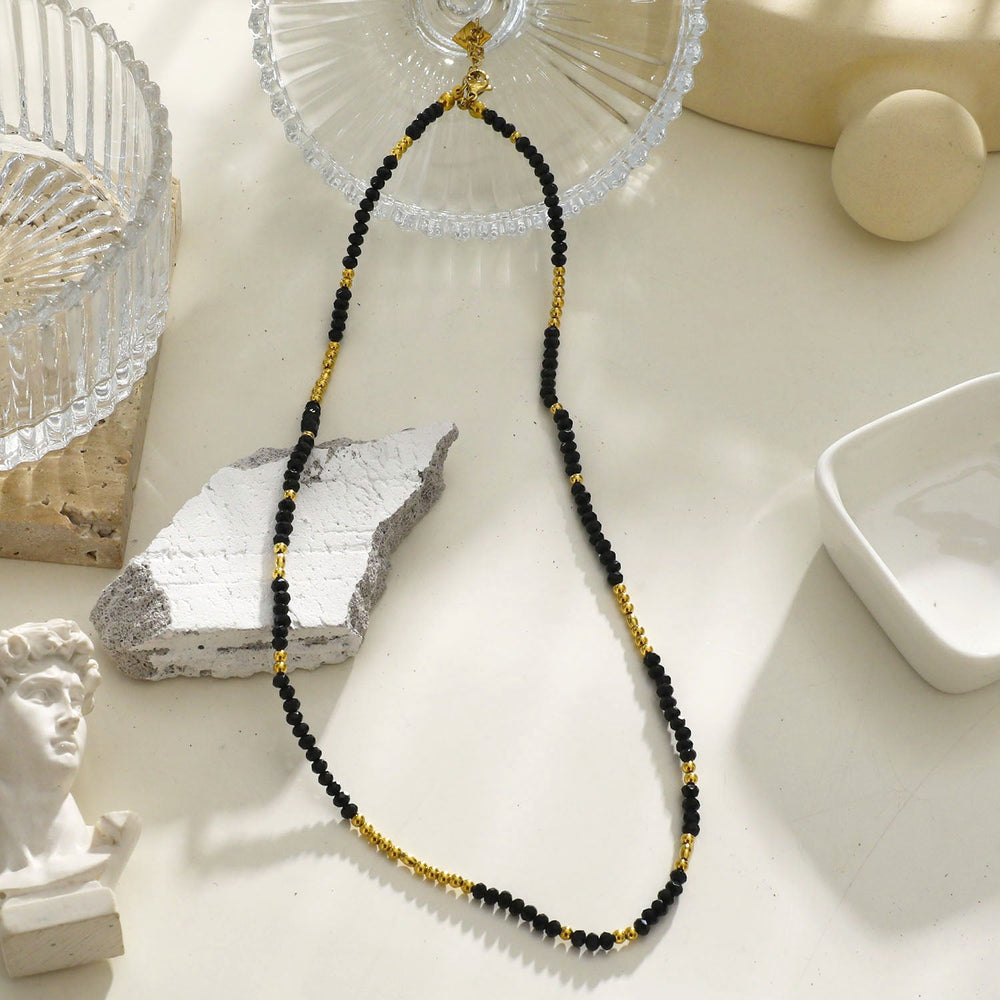 Collier LINA à Maillons avec Perles de Cristal Noir et Or