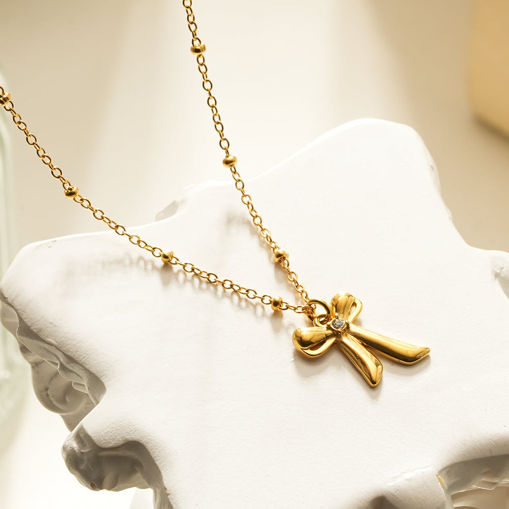 TALIANA Or : Collier délicat à chaîne perlée avec pendentif nœud et zircone solitaire – Bijou élégant pour tous les jours