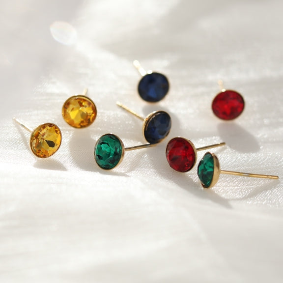 Clous d'oreilles URSA en cristal coloré