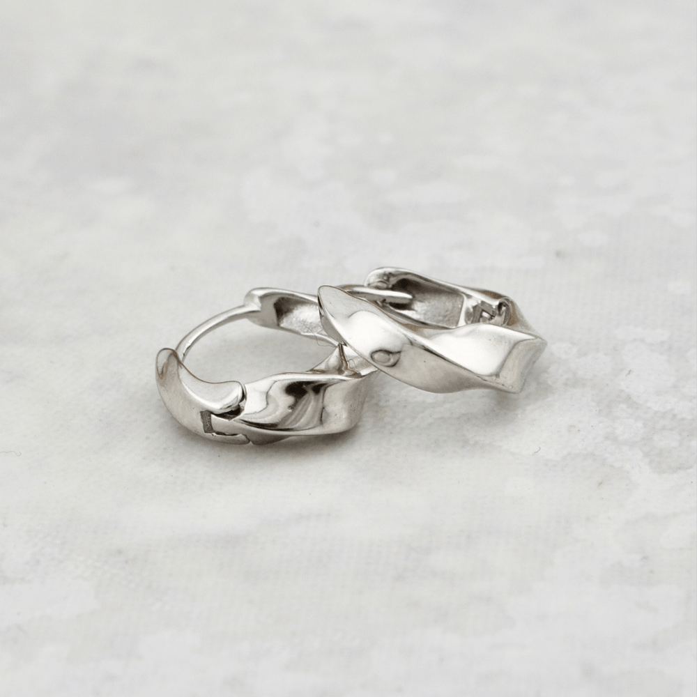 Sterling Silver Twisted Huggie Earrings