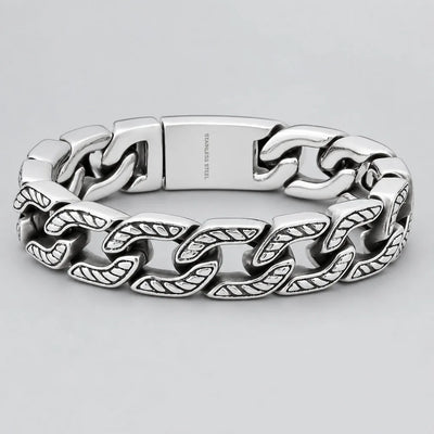 Bracelet gourmette cubaine épaisse en acier inoxydable pour hommes. Chaîne de motard avec accent chevron oxydé.