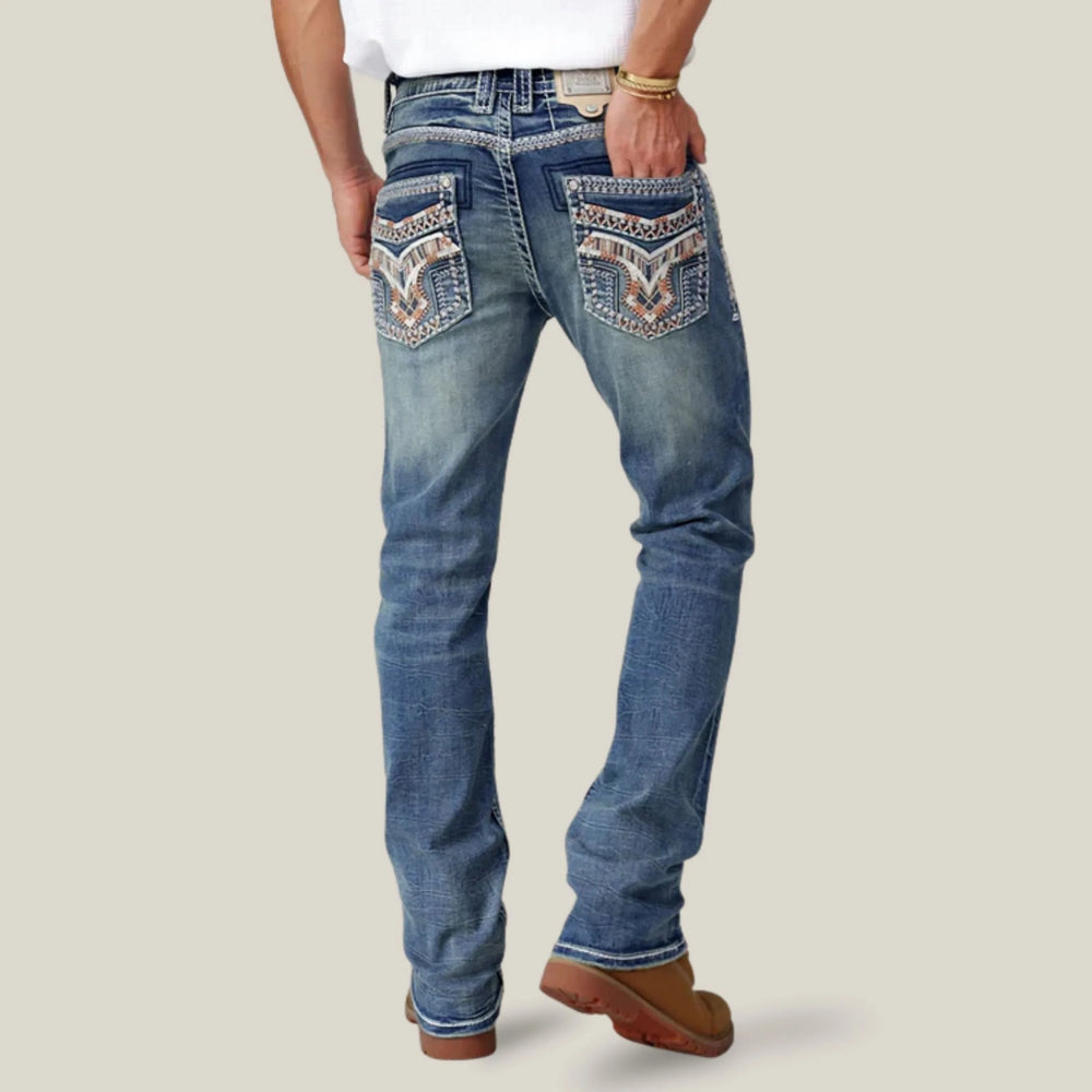 Jeans Homme Eagle Warrior Premium Coupe Bootcut. Denim Extensible 7 Poches avec Broderie Tribale
