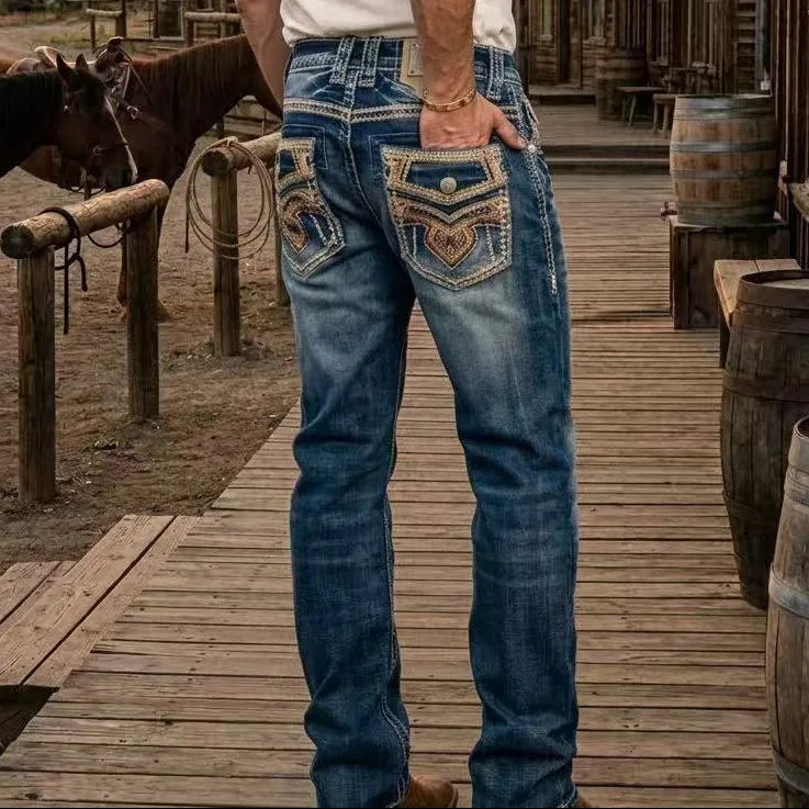Jeans bootcut Eagle Warrior pour hommes. Denim extensible 7 poches avec broderie tribale.