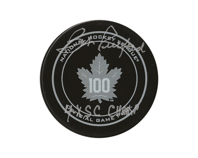 Palet de match officiel des Maple Leafs de Toronto 100e anniversaire, signé par Bob Pulford, avec l'inscription « 4x SC Champ »