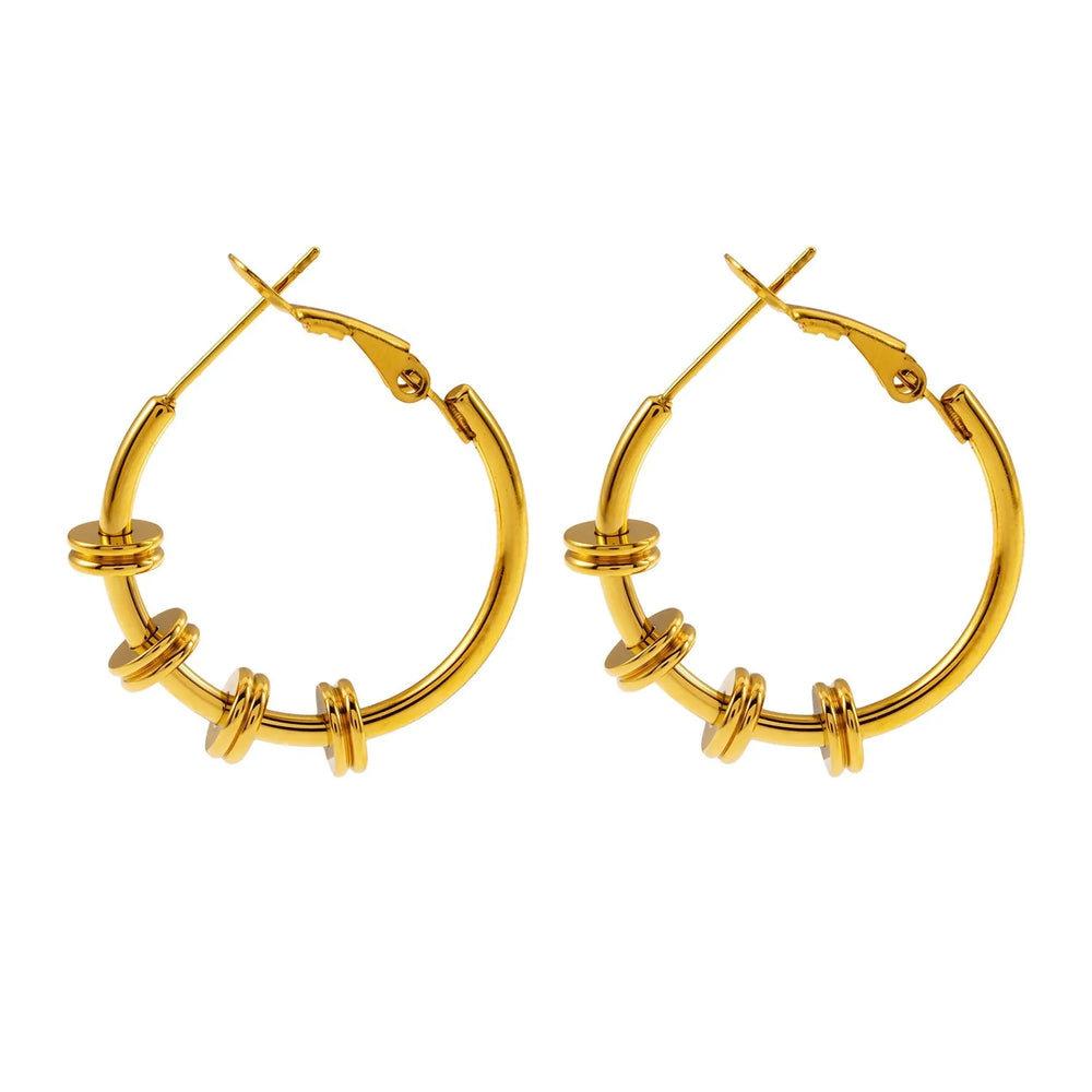 MINATO : Boucles d'oreilles anneau ancrant des disques doubles style industriel-chic moderne.