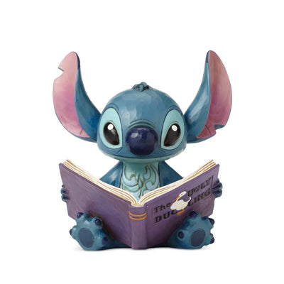 Disney Stitch Lisant "Trouver une famille" par Jim Shore