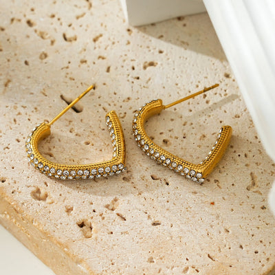 Style ANJAR Gold: Heart Shaped Hoops embedded with Zirconia Gemstones