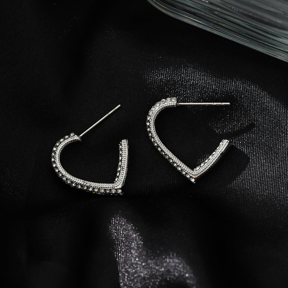 Style ANJAR White Gold (Silver Tone): Heart Shaped Hoops embedded with Zirconia Gemstones
