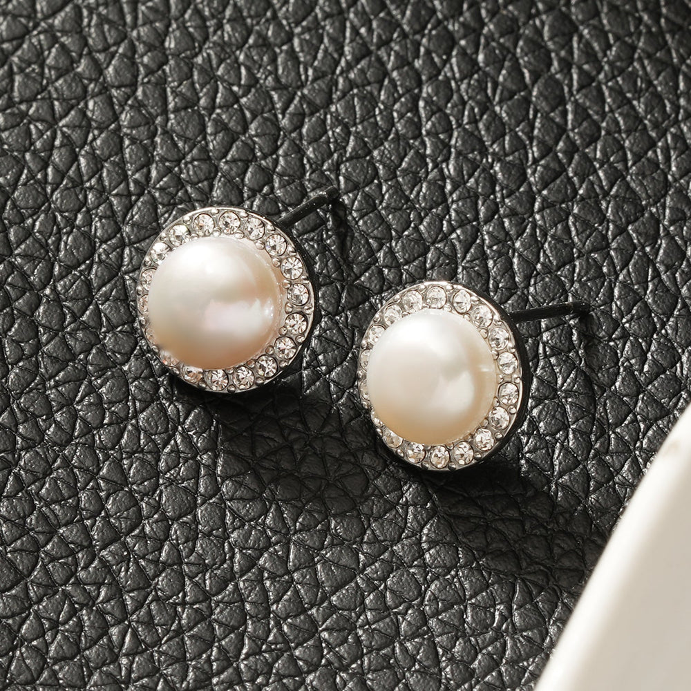 Boucles d'oreilles clous miniatures CADDA Argent (Or blanc) : Perle d'eau douce et bordure de zircone pavée
