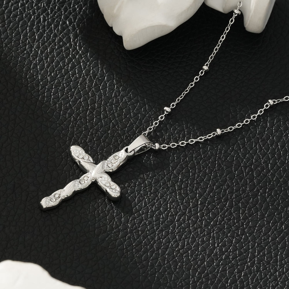 CHAMONIX Argenté: Collier délicat à chaîne perlée avec pendentif croix incrusté de zircone