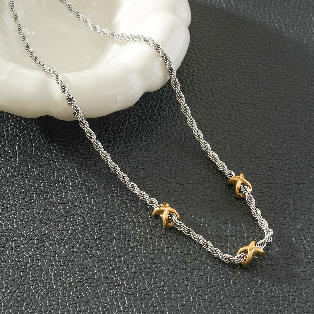 COSMINA Métaux Mixtes : Collier Corde Argent avec Charms Mini Croisés Dorés