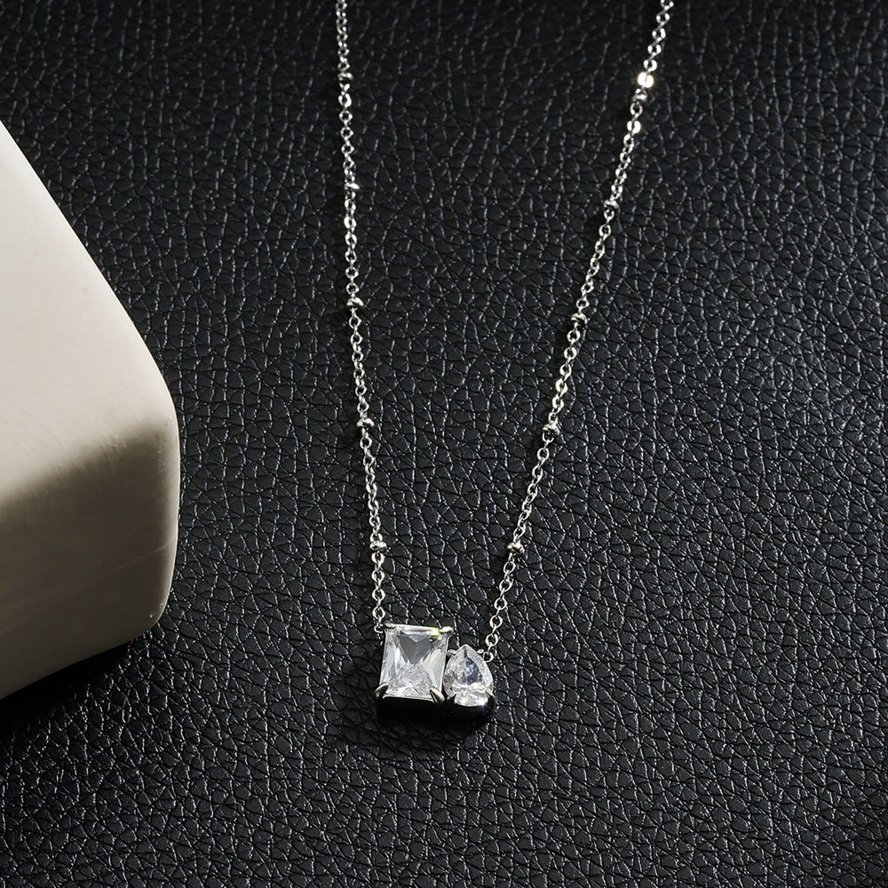 MAFFINA Argent (Or Blanc) : Collier à chaîne perlée délicate avec pendentif duo de zircones