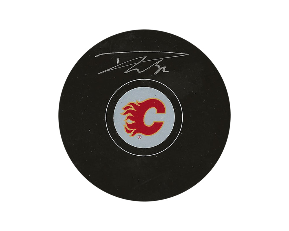 Palet de hockey autographe des Flames de Calgary, signé par Dustin Wolf