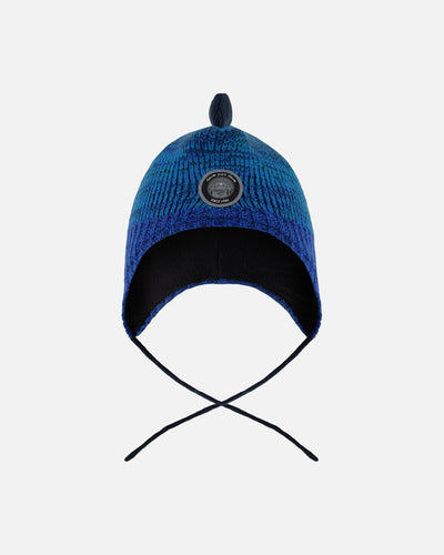 Bonnet péruvien tricoté doublé motif dinosaure avec pompon bleu