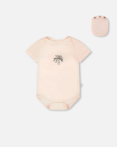 Grenouillère évolutive en jersey de coton biologique pêche