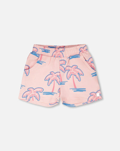 Shorts en molleton rose clair à imprimé palmiers