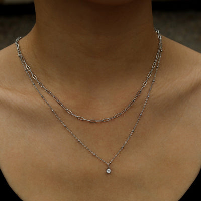 KATERI Argent : Collier à chaînes superposées avec pendentif en zircone solitaire