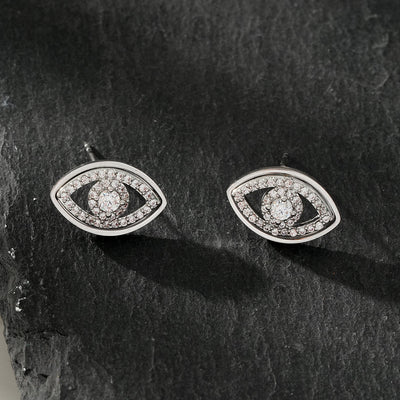 Boucles d'oreilles clous LUCKY EYE Or blanc (ton argenté) : Œil maléfique orné de zircone (CZ)