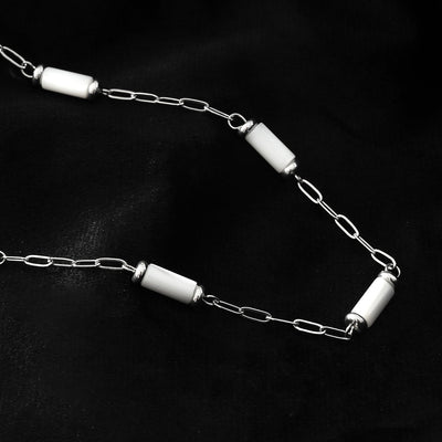 MALIBU : Collier à maillons mixtes avec coquillage naturel et métal plaqué or blanc (ton argenté)