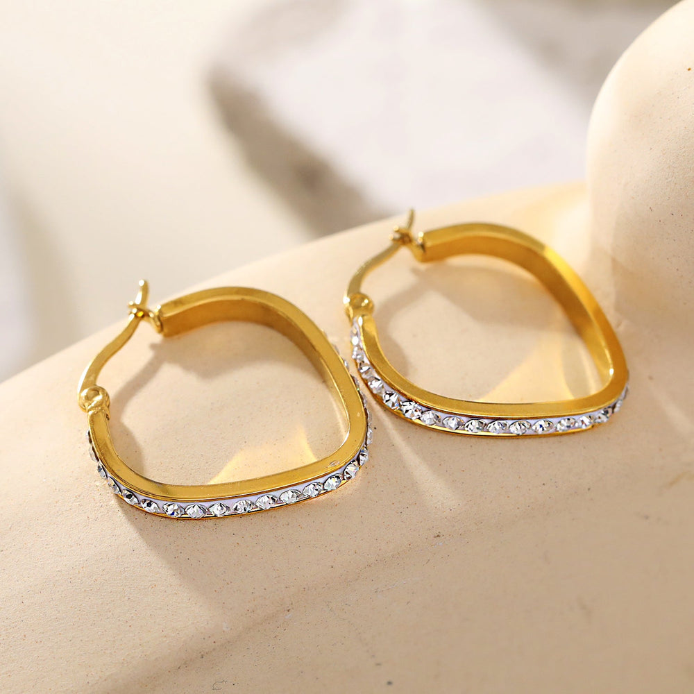 Style MELFI Or : Boucles d'oreilles créoles abstraites en forme de cœur serties de zircons