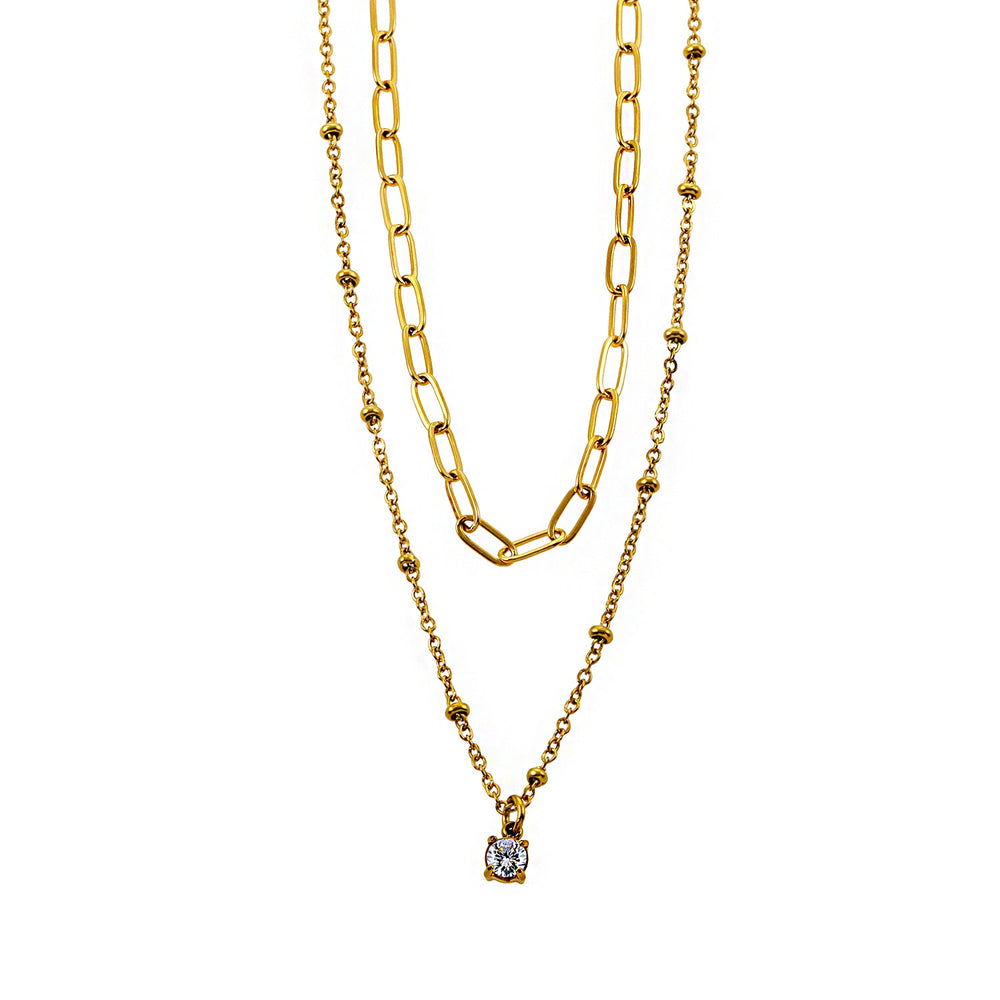 KATERI Or : Collier à chaînes superposées avec pendentif en zircone solitaire