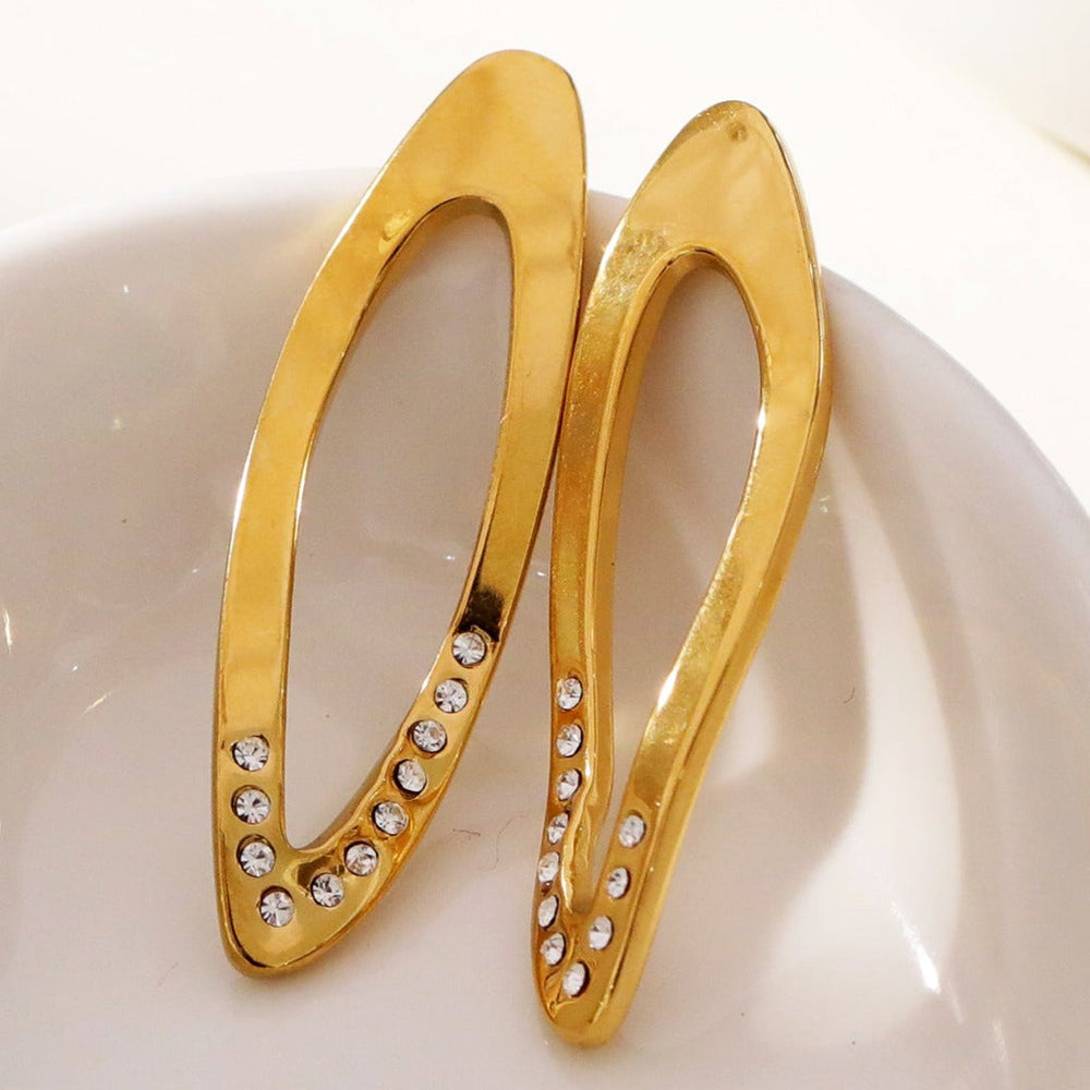 ESSABEL : Boucles d'oreilles créoles sculptées serties de zircone