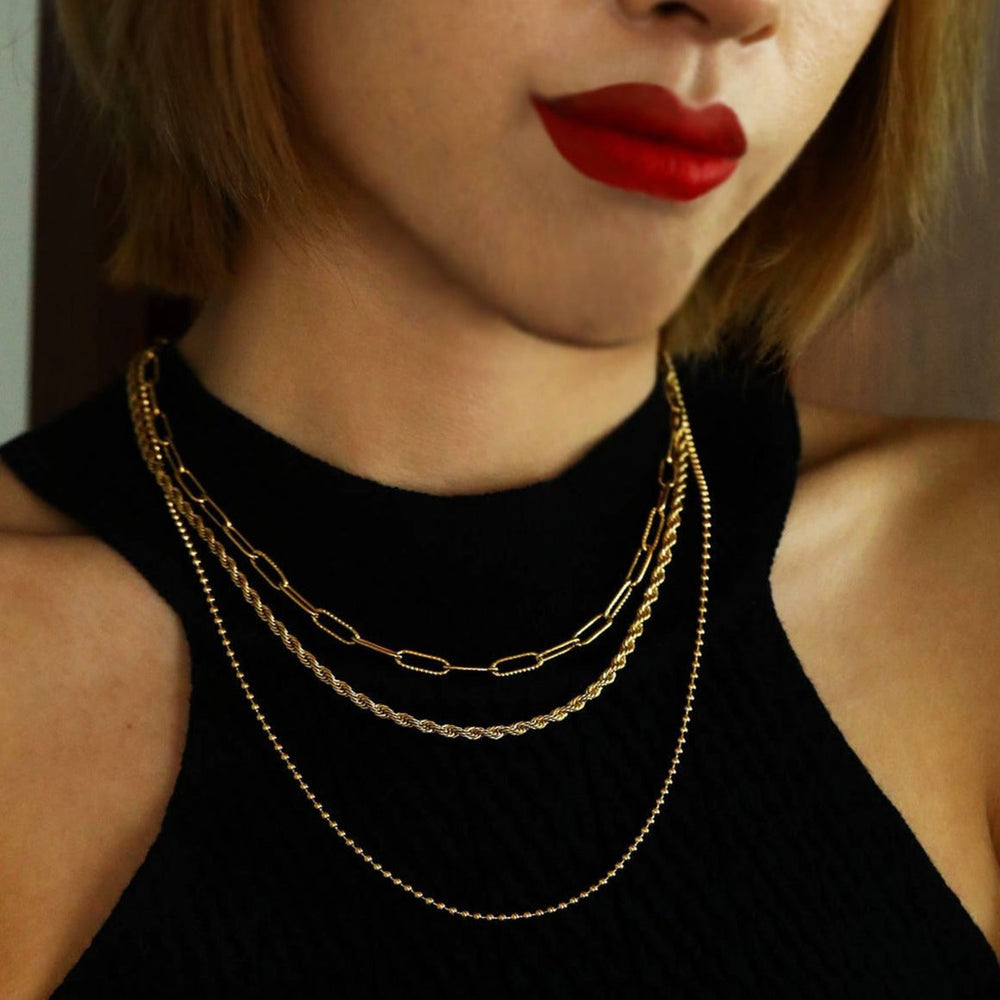 SELENE : Collier à chaînes mixtes à triple rang plaqué or