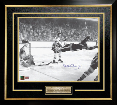 BOBBY ORR 'THE GOAL' SIGNED 16" X 20" FRAMED PHOTO - BOSTON BRUINS NHL COLLECTIBLE - GNR COA (24" BY 20")