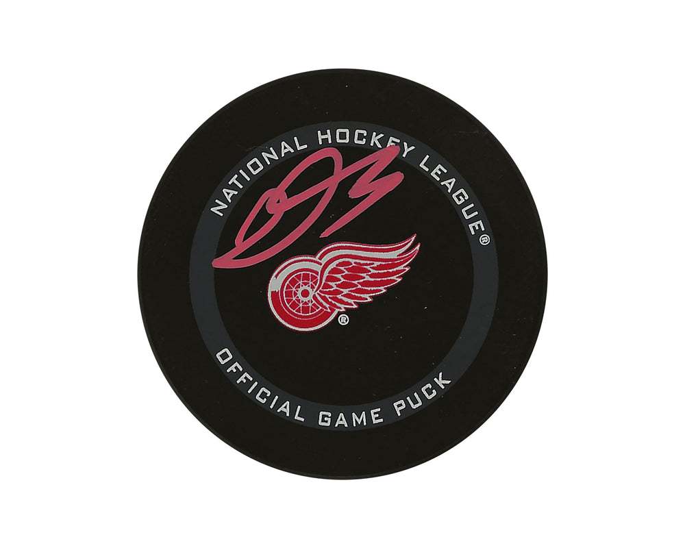 Palet de match officiel des Red Wings de Detroit autographié par Donovan Sebrango