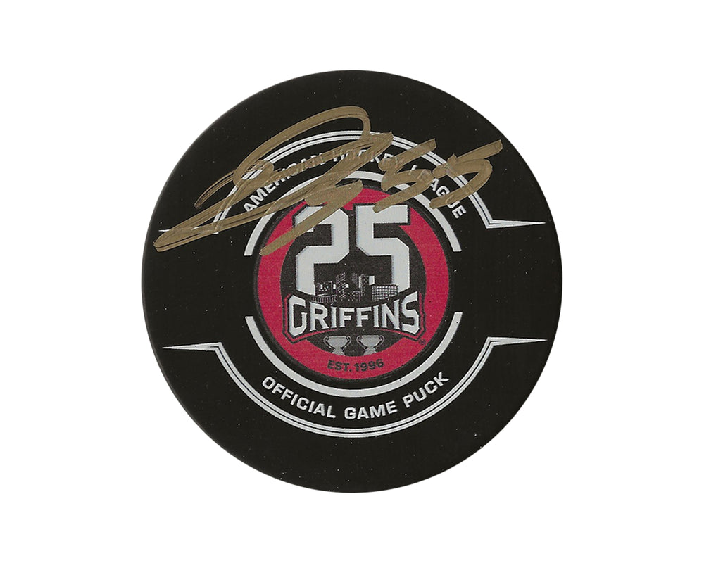 Palet de match officiel des Grand Rapids Griffins autographié par Donovan Sebrango